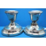 Pair of hallmarked silver stub weighted candlesticks, London assay, H: 80 mm, 156g. P&P Group 2 (£