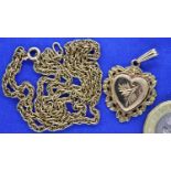 9ct gold heart shaped locket and a neck chain, 8.8g. P&P Group 1 (£14+VAT for the first lot and £1+