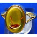 9ct gold amber set ring, size N, 2.7g. P&P Group 1 (£14+VAT for the first lot and £1+VAT for