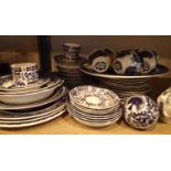 Shelf of mixed mainly blue and white dinner sets to include Royal Worchester. Not available for in-