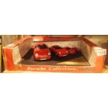 Boxed set of four model Porsche cars. P&P Group 2 (£18+VAT for the first lot and £3+VAT for