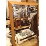 Beech framed bevelled edge wall mirror. Not available for in-house P&P, contact Paul O'Hea at