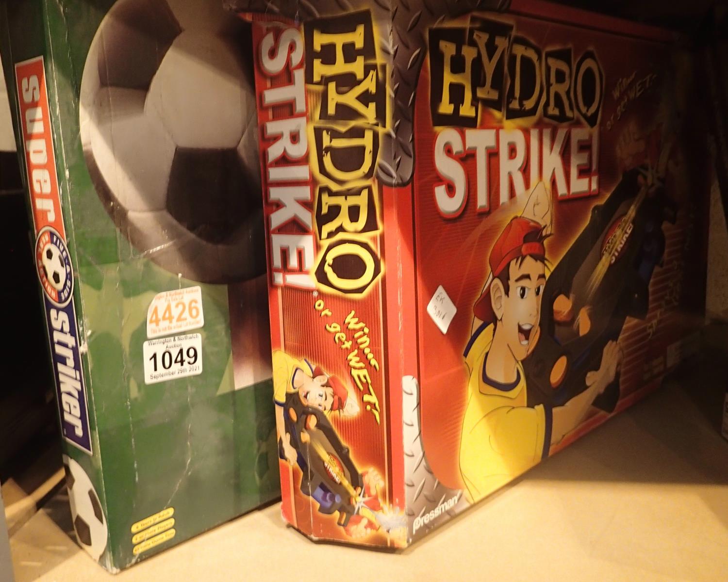 Super Striker football game and hydro strike. Not available for in-house P&P, contact Paul O'Hea