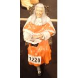 Royal Doulton ceramic figure the Judge, lacking thumb. P&P Group 2 (£18+VAT for the first lot and £