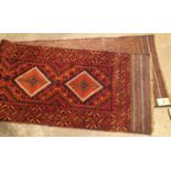 Hand knotted woollen red and blue runner made by TS Oriental carpets, 23'' x 93''. Not available for