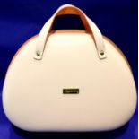 Cream hard cased Champneys travel handbag, L: 35 cm. P&P Group 2 (£18+VAT for the first lot and £3+