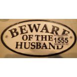 Cast iron Beware Of The Husband sign, L: 175 cm. P&P Group 1 (£14+VAT for the first lot and £1+VAT