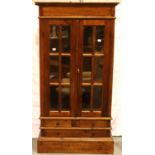 Tall glazed hardwood cupboard with drawer below, 97 x 41 x 194 cm H. Not available for in-house P&P,