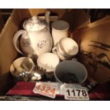 Box of mixed ceramics to include Aynsley tea set, Royal commemorative cups and coins. Not