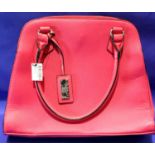 Pink leather handbag by Next with tag, L: 39 cm. P&P Group 2 (£18+VAT for the first lot and £3+VAT