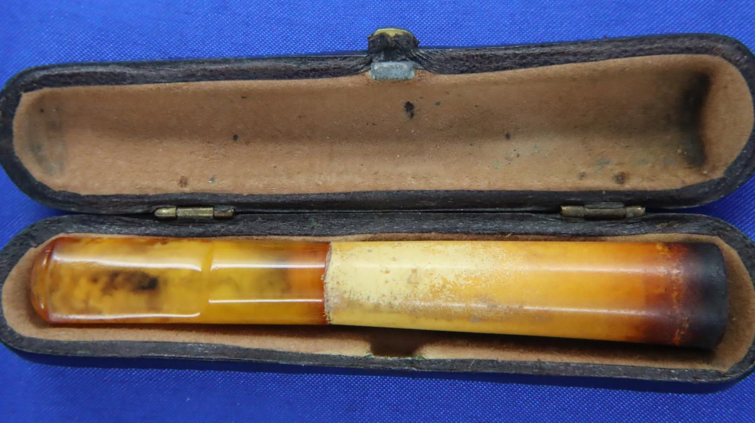 Antique block amber cigarette/cheroot holder in a fitted case, L: 90 mm. P&P Group 1 (£14+VAT for - Image 2 of 2