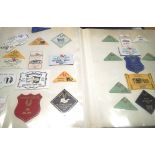 An album containing a large quantity of Caravan Club Rally badges, from 1970 -1990s. P&P Group 2 (£