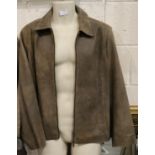 Ladies new sheepskin coat, made in England, size M. P&P Group 3 (£25+VAT for the first lot and £5+