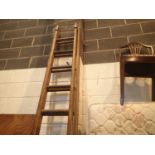 Twelve rung double wooden ladder. Not available for in-house P&P, contact Paul O'Hea at Mailboxes on