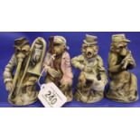 Set of four 19th/20th century Chinese monkey band figures, bisque glazed, largest H: 15 cm. No