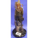 Substantial carved jade immortal figure raised on a carved circular base, figure has had repair,