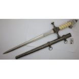 WWI Imperial German Navy replica dagger with ivory style wired grip and plannished metal scabbard.