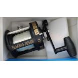 Boxed Shakespeare Sea Wolf multiplier geared reel with graphite body. P&P Group 1 (£14+VAT for the