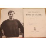 Bobby Charlton book of football with signature opposite portrait page. (book in fair condition