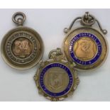 Liverpool Football League Association: two enamelled silver medal fobs, (1933-4) and a Liverpool SSU