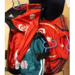 Liverpool Football Club branded promotional items including scarves and childrens tops. P&P Group