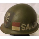 Vietnam War period ARVN Force M1 helmet, later painted. P&P Group 2 (£18+VAT for the first lot