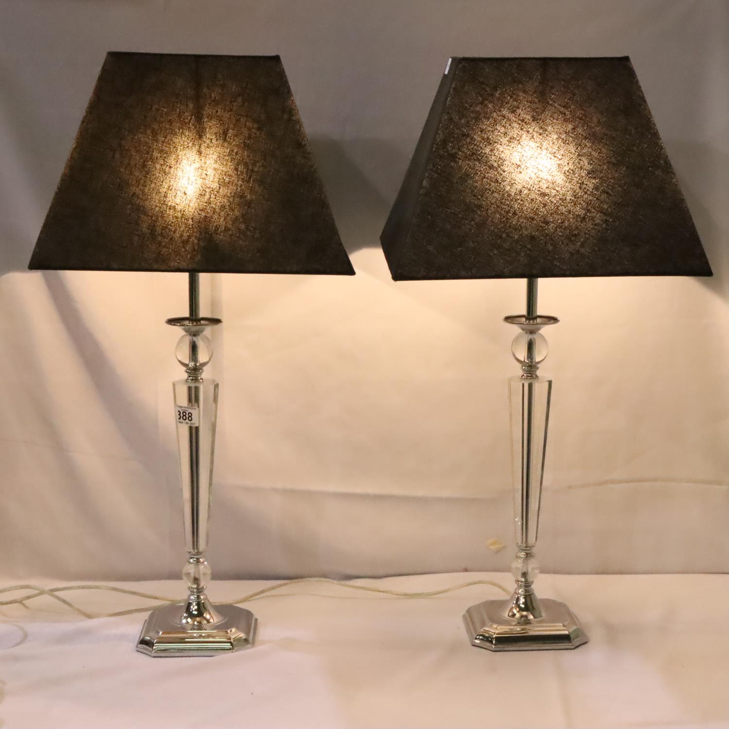 Pair of tall glass and chrome table lamps, H: 85 cm. Not available for in-house P&P, contact Paul