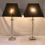 Pair of tall glass and chrome table lamps, H: 85 cm. Not available for in-house P&P, contact Paul
