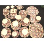 Forty pieces of Royal Winton chintz Florence pattern teaware, some crazing to underside of plates,