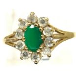 9ct gold emerald and white stone set ring, size O, 1.8g. P&P Group 1 (£14+VAT for the first lot