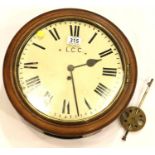 19th/20th century mahogany cased wall clock with pendulum, D: 40 cm. Ticks for 2 minutes then stops,