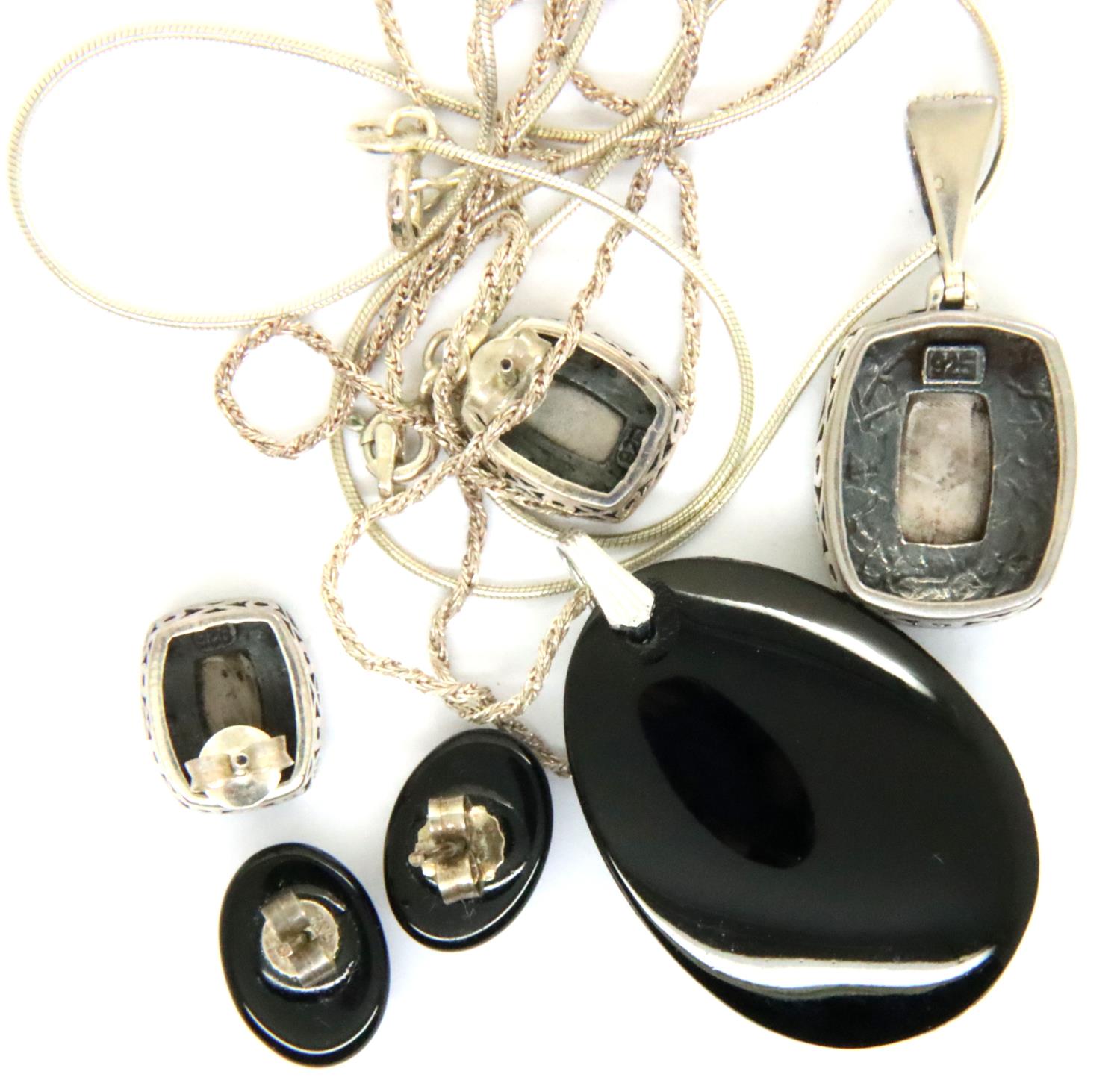 Two sets of silver pendant and chains with matching earrings and cameo on black hardstone. P&P Group - Image 2 of 2