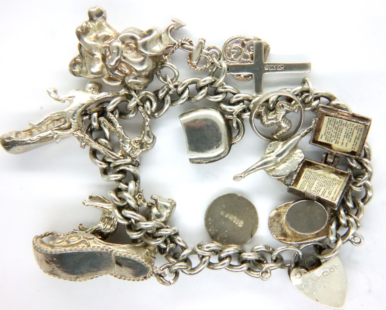 925 silver charm bracelet with fourteen charms, 49g. P&P Group 1 (£14+VAT for the first lot and £1+ - Image 2 of 3