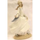 Lladro figurine of a Young Lady, H: 20 cm, with damage to fingers. P&P Group 2 (£18+VAT for the