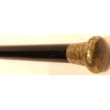 An Edwardian ebonised walking cane with silver pommel. P&P Group 3 (£25+VAT for the first lot and £