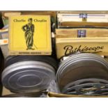 Box of twenty four 8mm and 9.5mm tape reels to include various Charlie Chaplin examples, Mickey