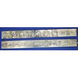 Two oriental white metal sticks embossed with figurines and inscription. Not available for in-