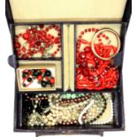 Leather jewellery box containing mixed jewellery including silver. P&P Group 2 (£18+VAT for the