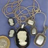 Two sets of silver pendant and chains with matching earrings and cameo on black hardstone. P&P Group
