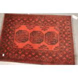 Single red woollen rug. Not available for in-house P&P, contact Paul O'Hea at Mailboxes on 01925