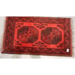 Single red woollen rug. Not available for in-house P&P, contact Paul O'Hea at Mailboxes on 01925