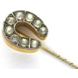 Georgian horseshoe stick pin, set with nine paste stones, L: 60 mm. P&P Group 1 (£14+VAT for the
