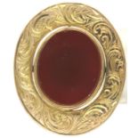 19th century 9ct gold swivel brooch mounted with bloodstone and carnelian, marks rubbed, L: 3 cm,