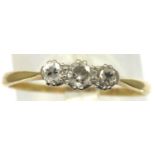 18ct gold set three stone diamond ring, size S/T, 1.9g. P&P Group 1 (£14+VAT for the first lot