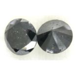 Two loose AIG certified black diamonds, each over 4cts. P&P Group 1 (£14+VAT for the first lot