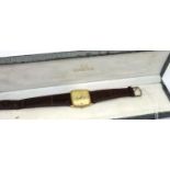 Omega; Seamaster quartz gents wristwatch on a brown leather strap, boxed, not working, wear to
