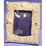 Hallmarked silver Edwardian easel back photograph frame 18 x 22 cm, picture size 9.5 x 13.5 cm. P&