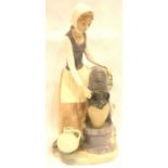 Nao figurine of a girl at a water fountain, H: 30 cm. P&P Group 3 (£25+VAT for the first lot and £