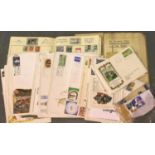 Mixed first day covers and two vintage stamp albums. P&P Group 1 (£14+VAT for the first lot and £1+