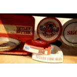 Collection of Skol and Tetley metal pub trays and ashtrays. Not available for in-house P&P,